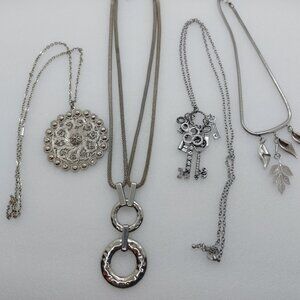 Lot of 4 Silver Tone Necklace Keys, Leaves, Circles
